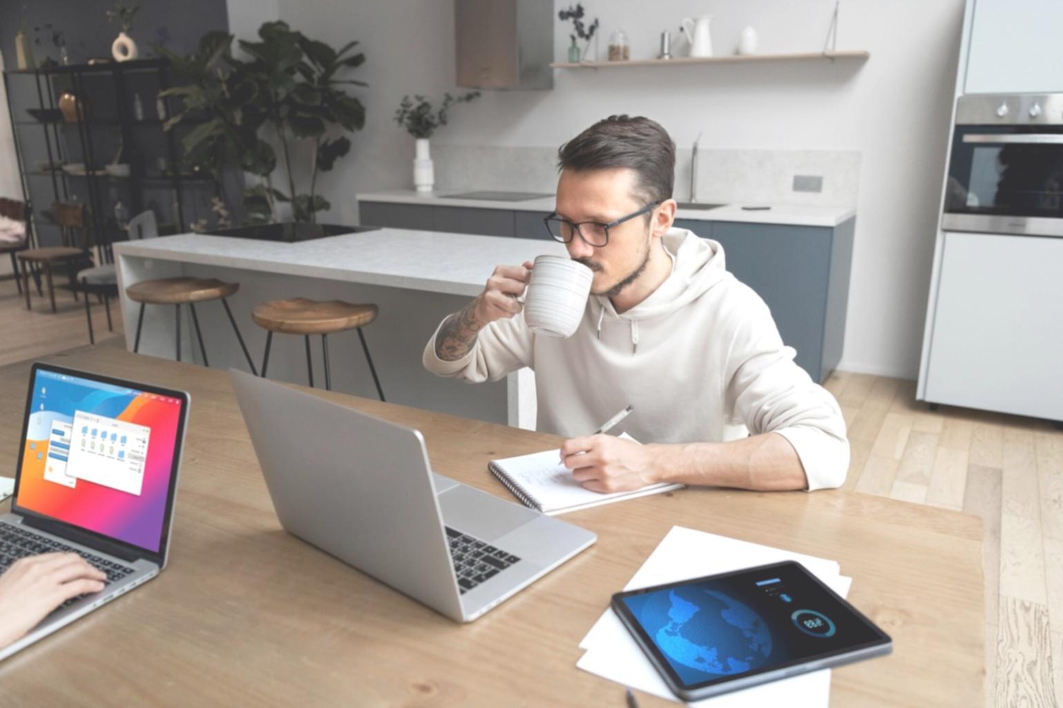 Professional reviewing financial documents and market data